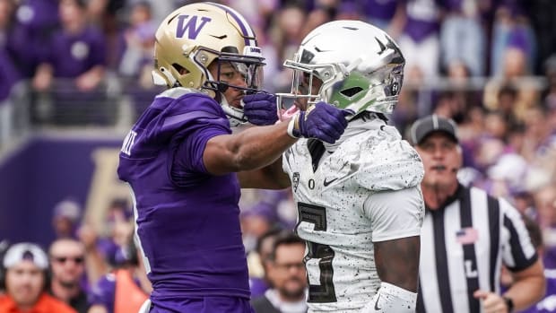 Rome Odunze celebrates a big catch against Oregon's Jahlil Florence
